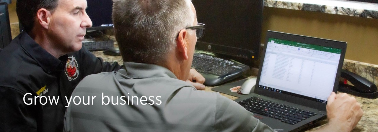 Grow your business Men on computer