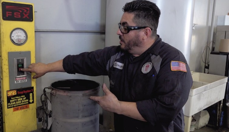 man with pneumatic cleaner