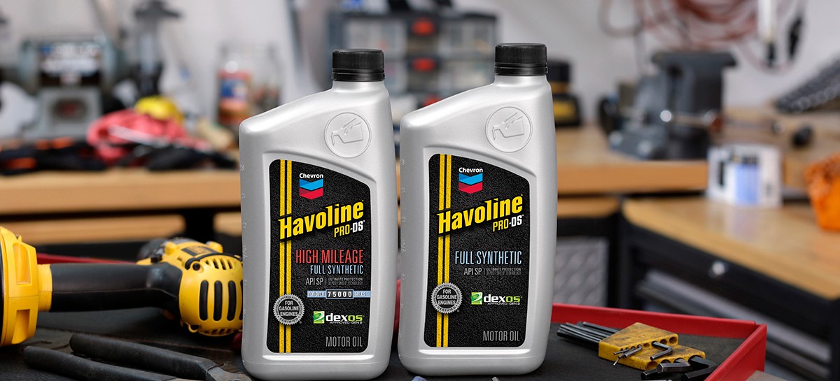Havoline GF-6 High Mileage and Full Synthetic Bottles on a Workb